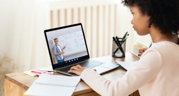 Black Schoolgirl Having Online English Lesson With Teacher At Home